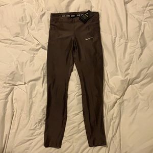 The Nike Speed Tight Fit copper 7/8 length legging